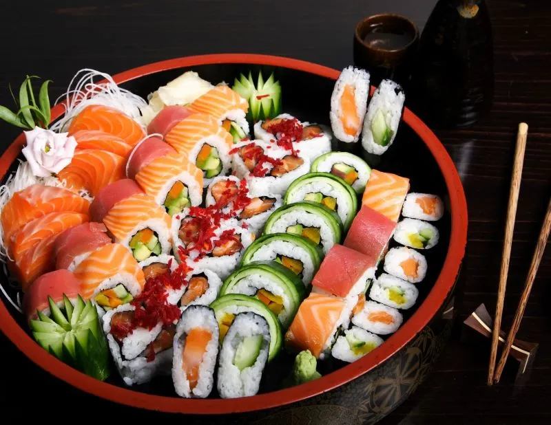 A close-up of a sushi roll, highlighting its intricate details.