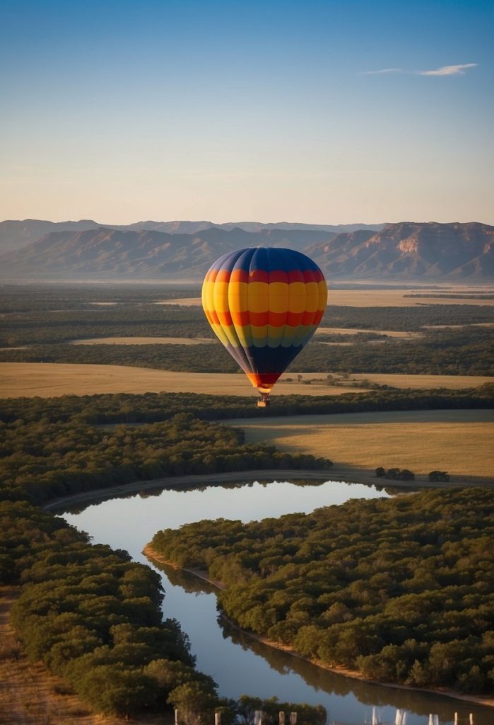 A colorful hot air balloon floats above the Texas landscape, with the Texas Sky Riders logo displayed prominently on the side