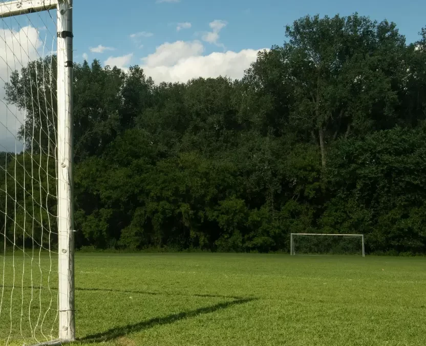 Green grass and football net at Chapel Park in Waco, TX