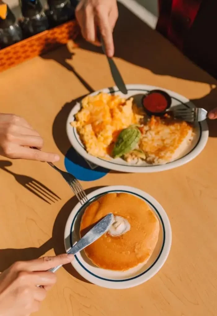 Delicious pancakes and omelets on a plate.