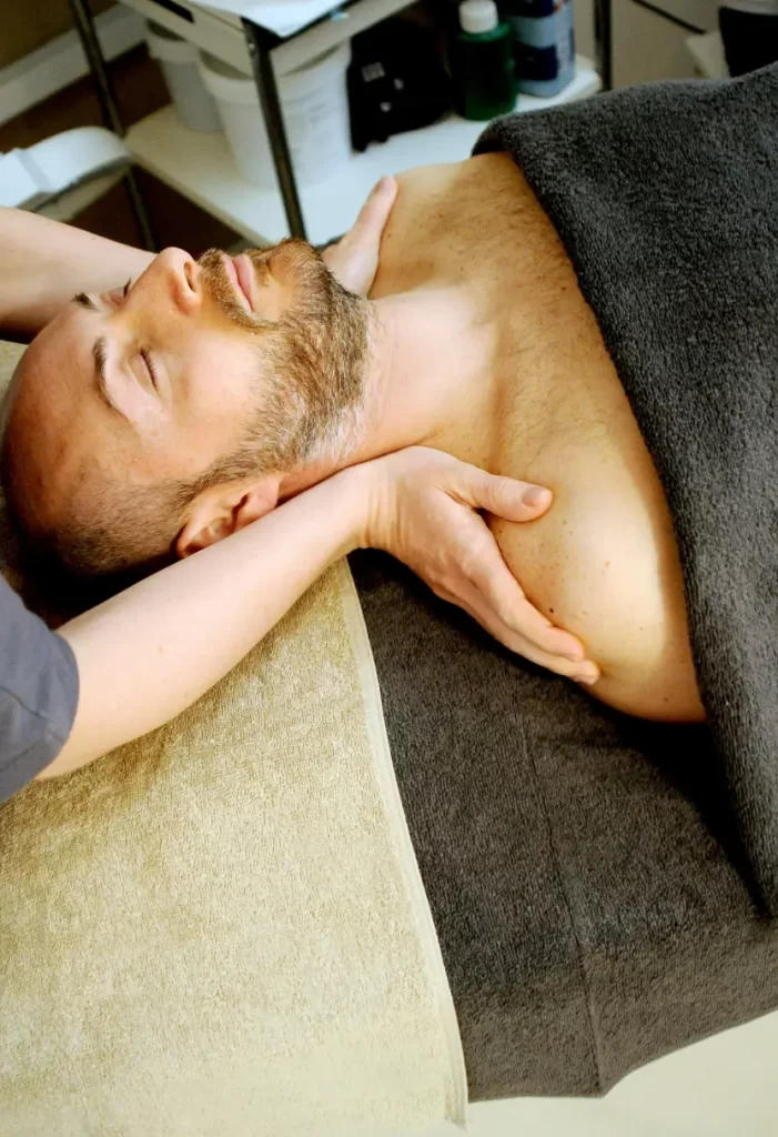 Best Massage Therapists in Waco Texas - Man receiving a therapeutic massage from a therapist.